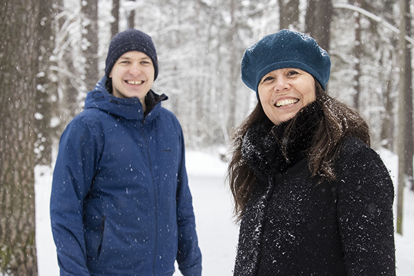 Two people photographed outdoors.